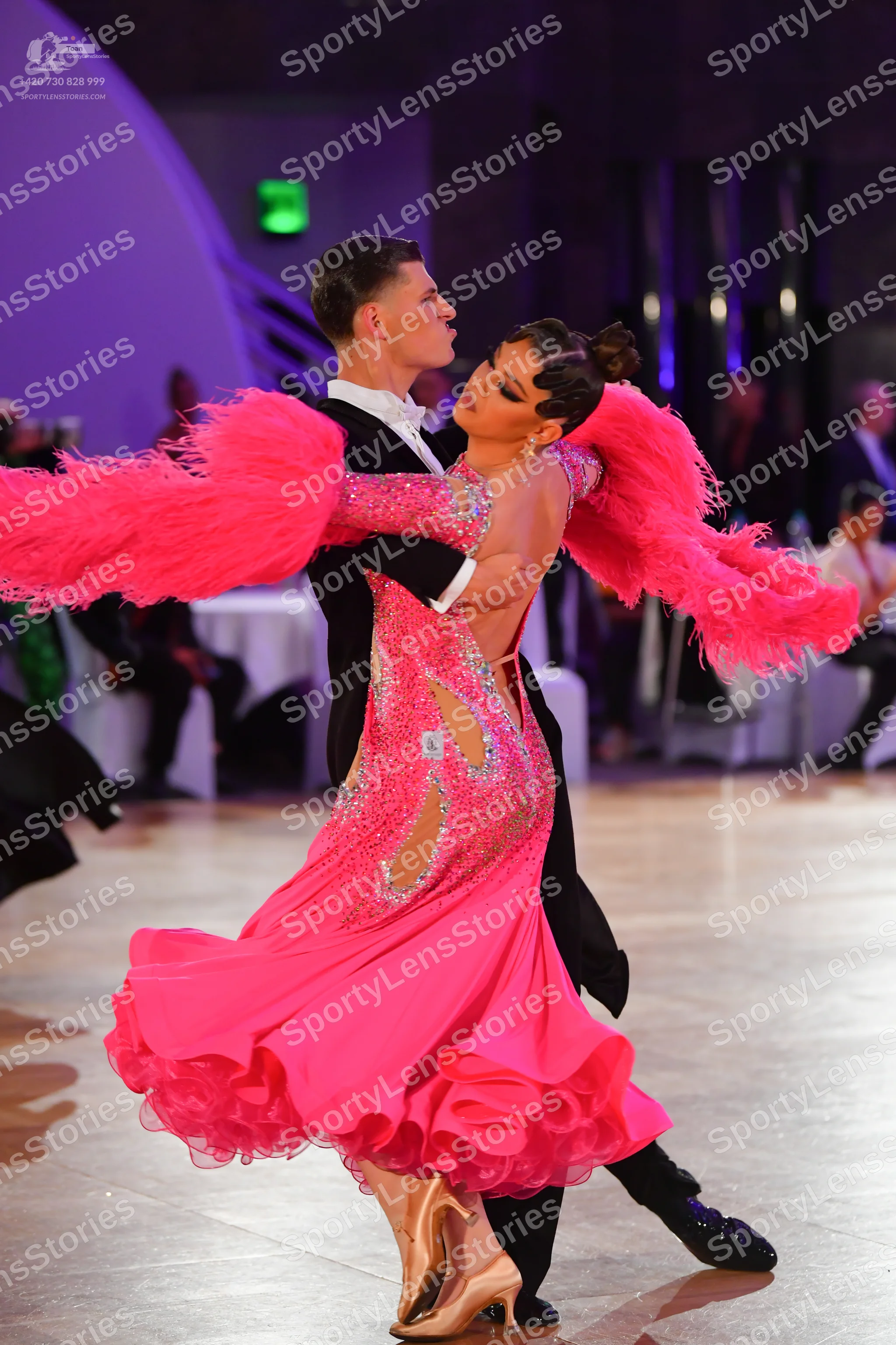 Dancesport competitor: Male dancer: black ballroom suit with a white shirt