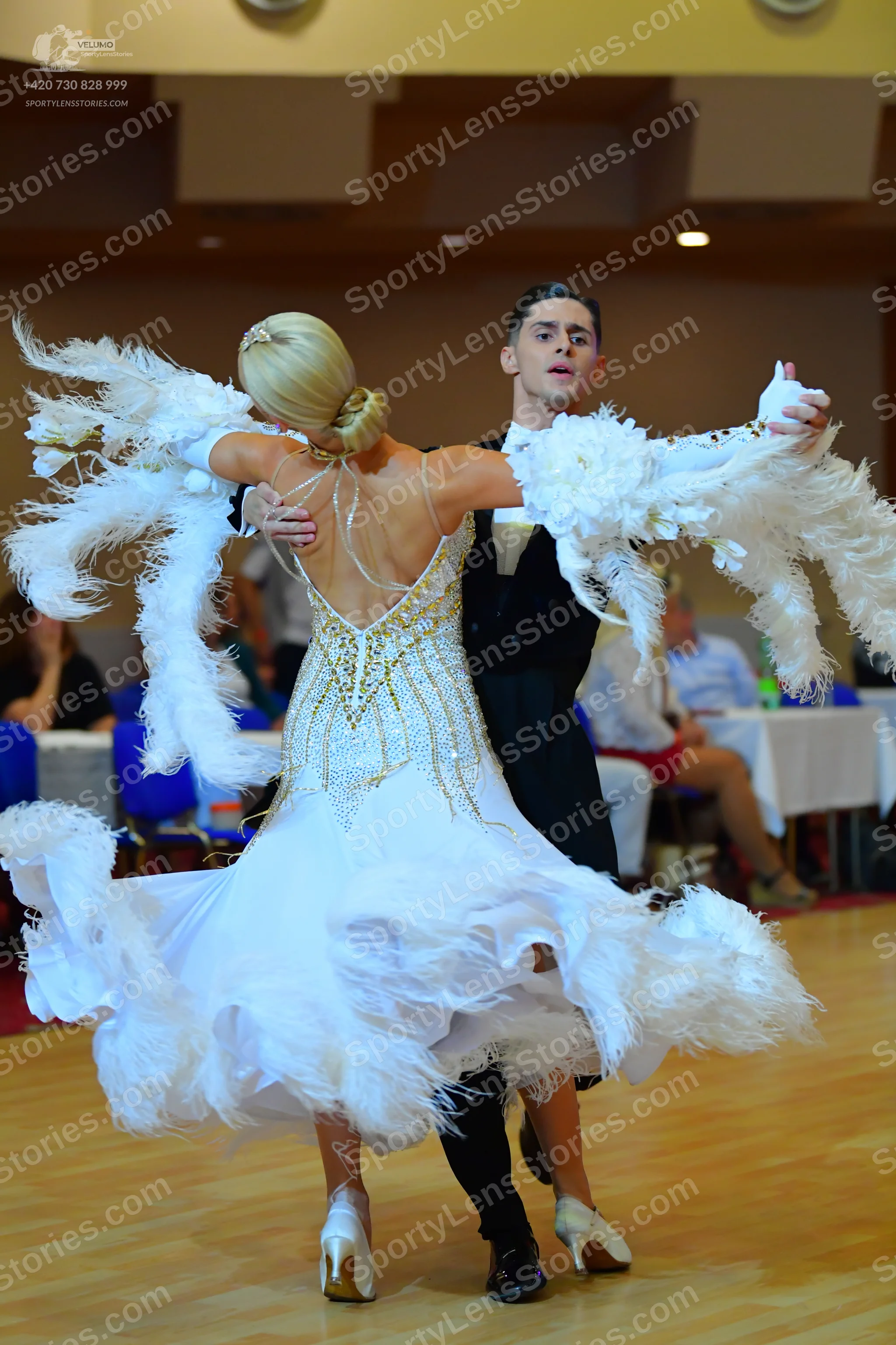 Dancesport competitor: Male dancer: black suit