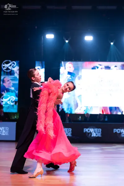 Dancesport competitor: Male dancer: black suit and black trousers