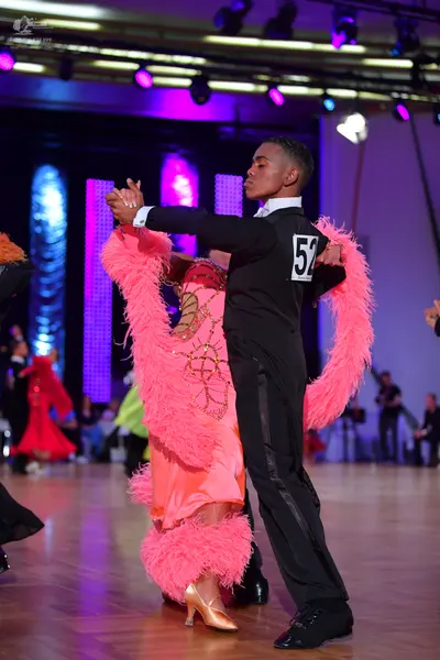 Dancesport competitor #52: Male dancer: black long-sleeved top and black trousers