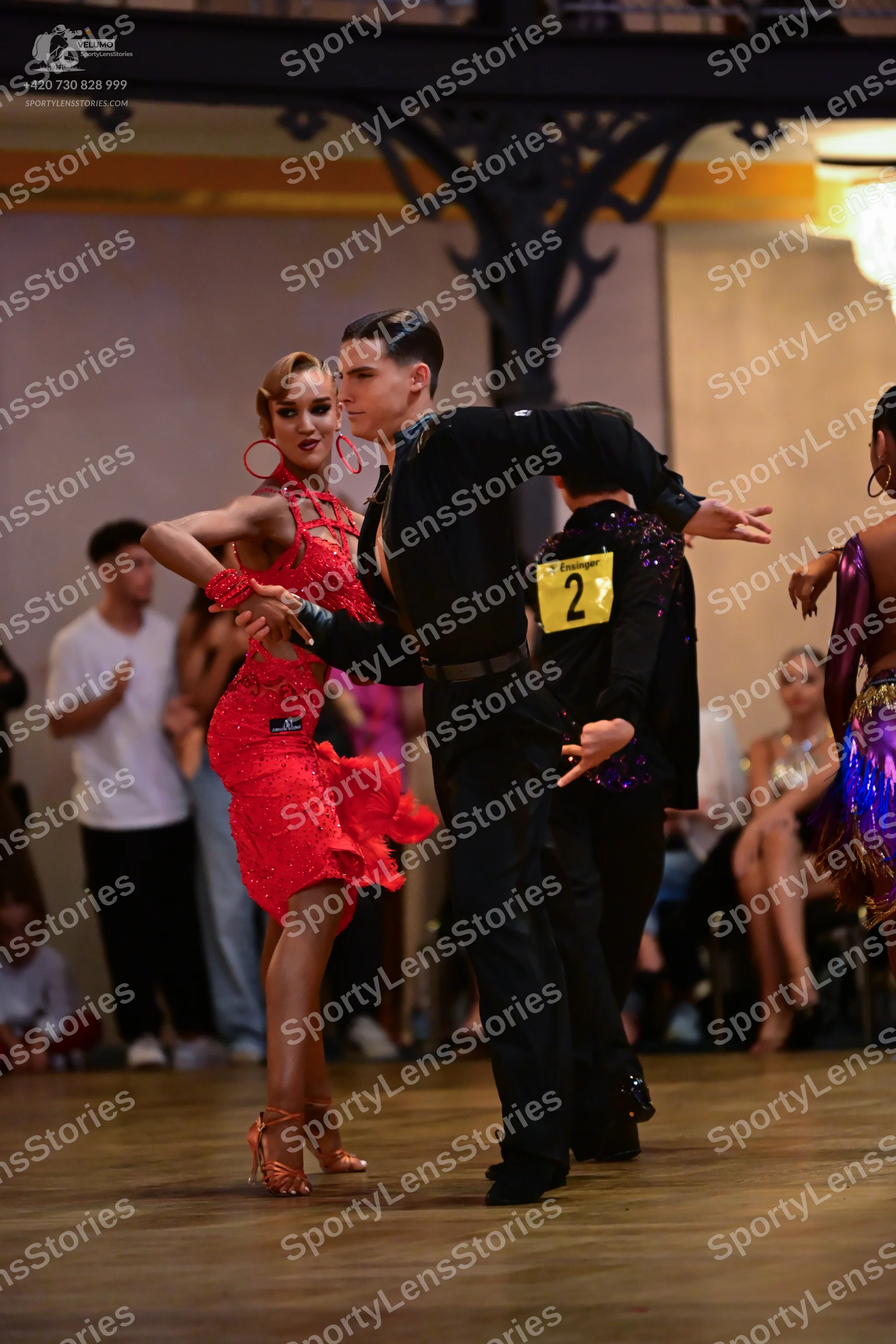 Dancesport competitor: Male dancer: black long-sleeved shirt and black trousers