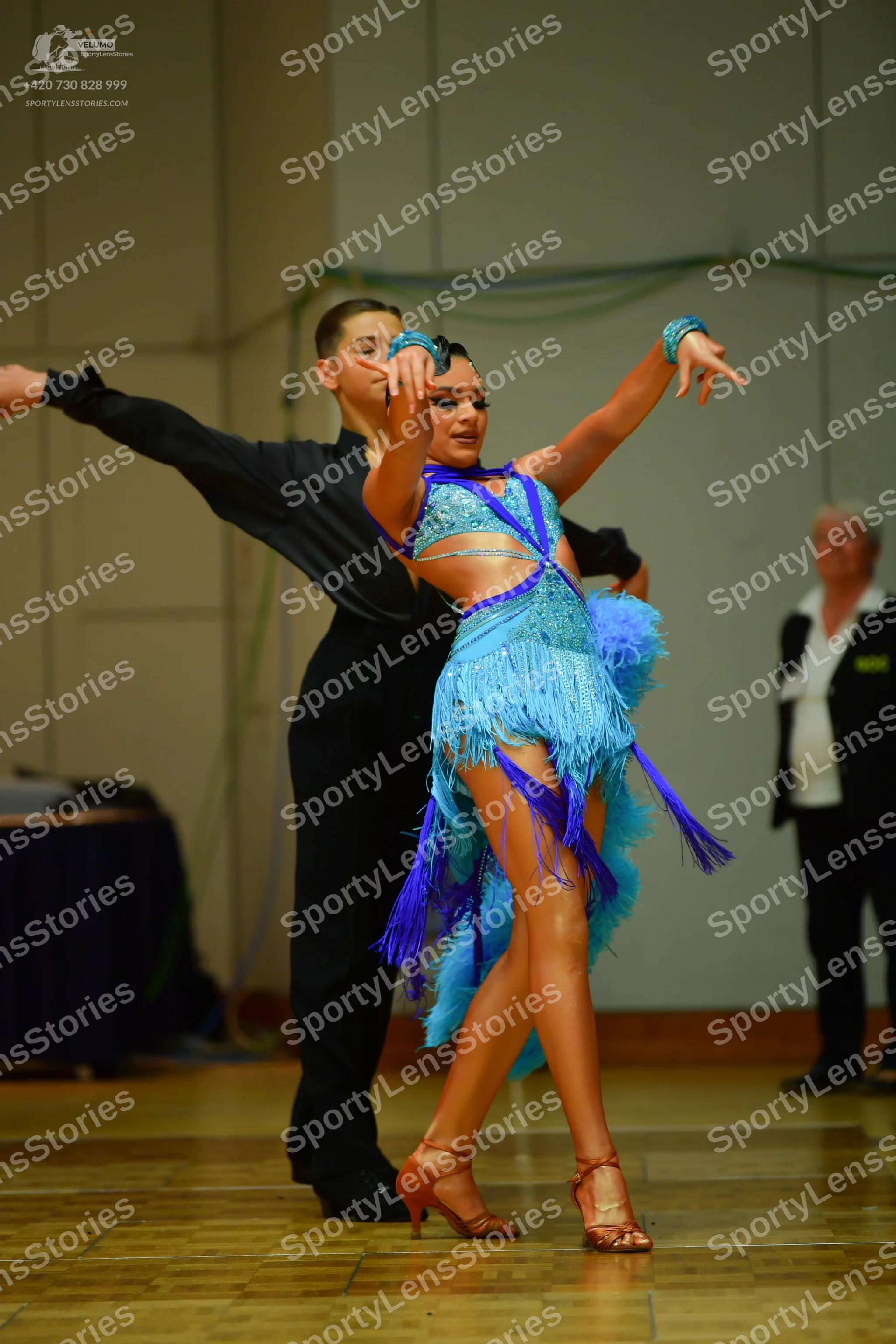 Dancesport competitor: Male dancer: black long-sleeved shirt and black trousers