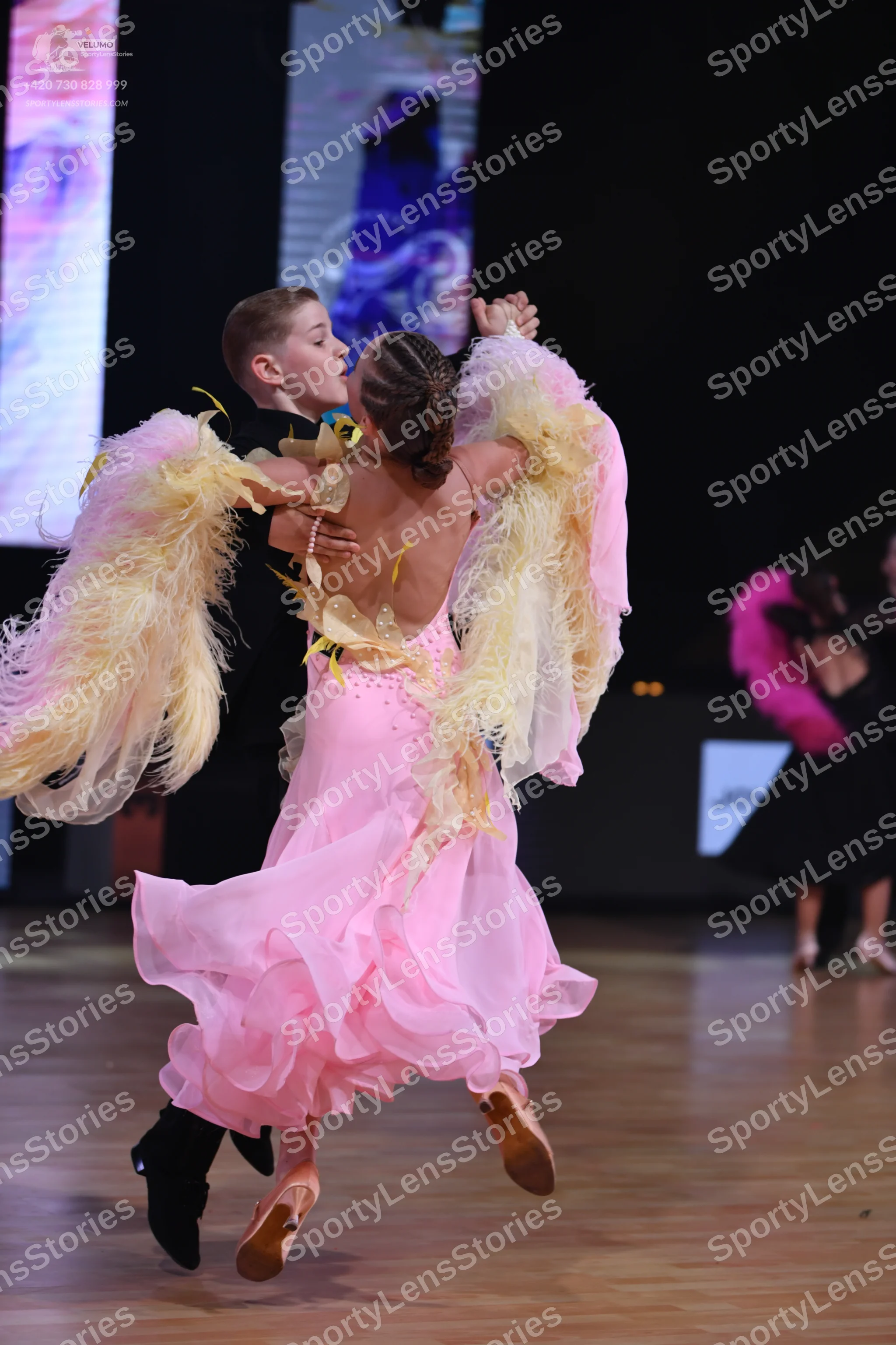 Dancesport competitor: Male dancer: black suit