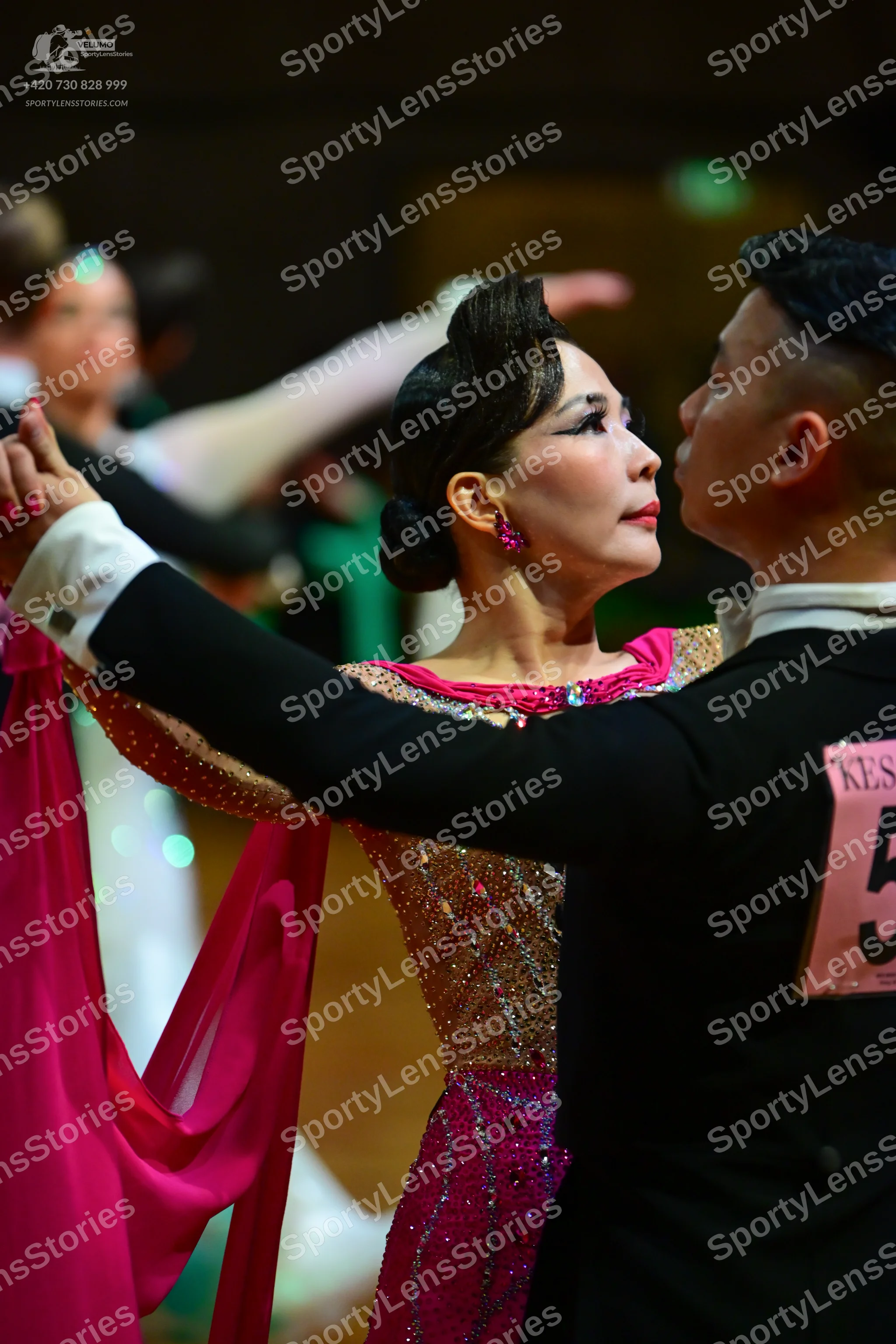 Dancesport competitor: Male dancer: black dance suit with a white shirt