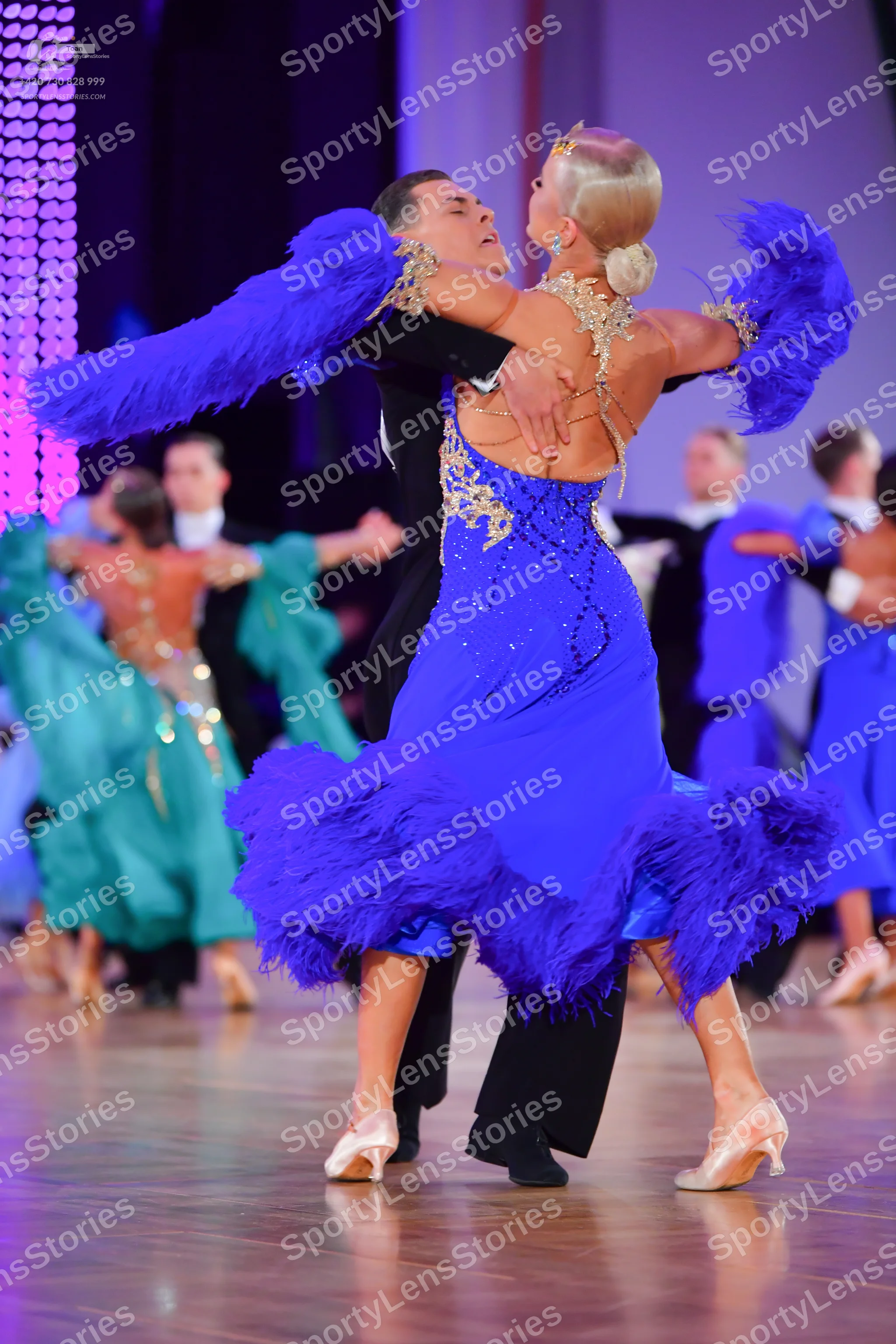 Dancesport competitor: Male dancer: black suit