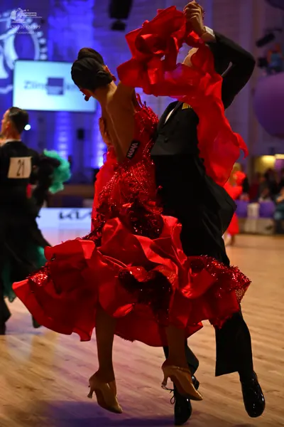 Dancesport competitor: Male dancer: black suit