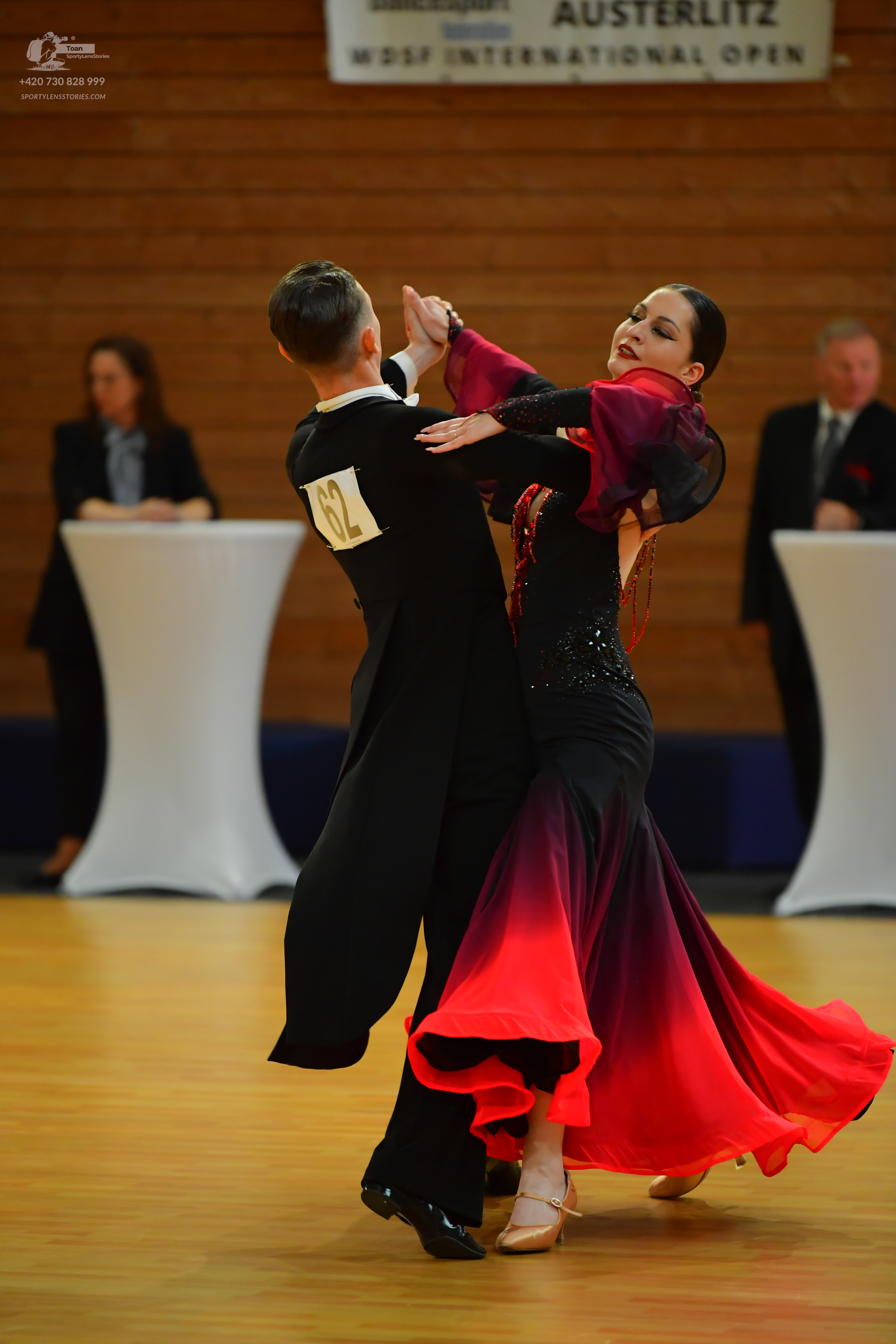 Dancesport competitor: ** Black tail suit with a subtle, dark gray sequin pattern on the lapels and jac