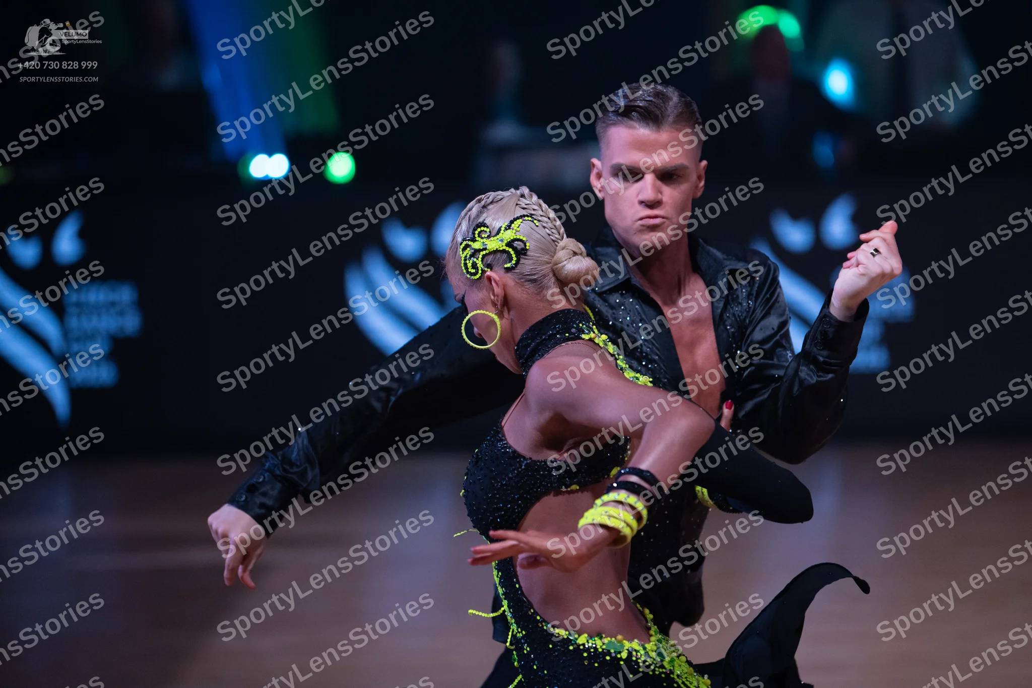 Dancesport competitor: Male dancer: black long-sleeved shirt with subtle sparkles