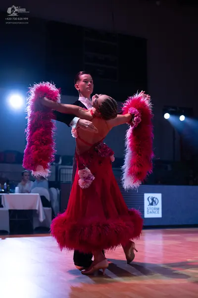Dancesport competitor: Male dancer: black suit