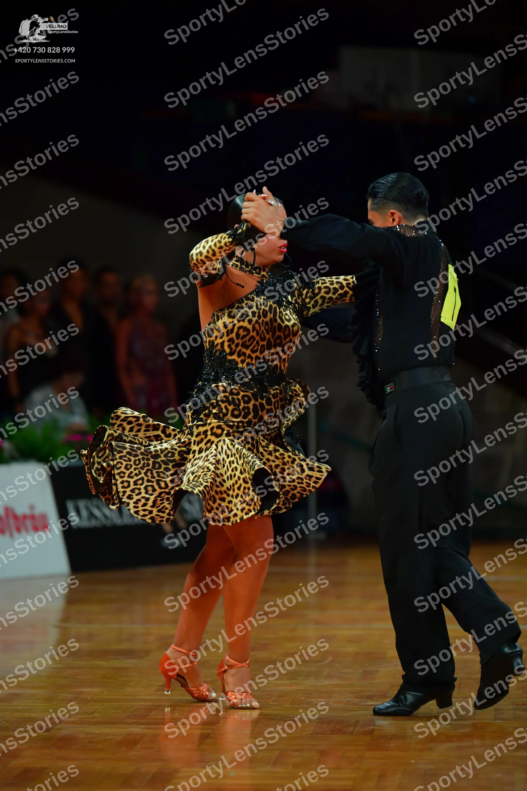 Dancesport competitor: Male dancer: black long-sleeved shirt and black trousers