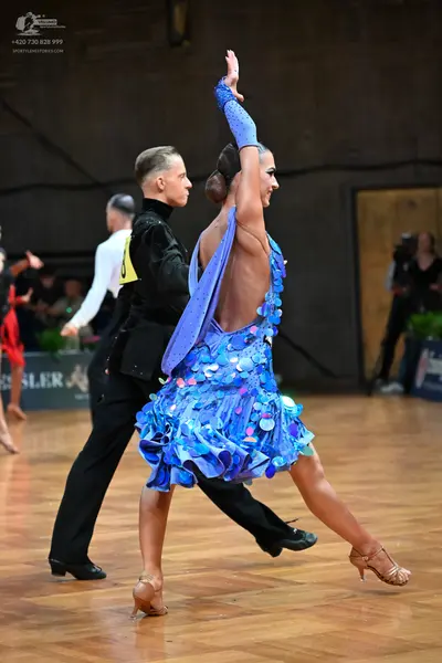 Dancesport competitor: Male dancer: black dance suit