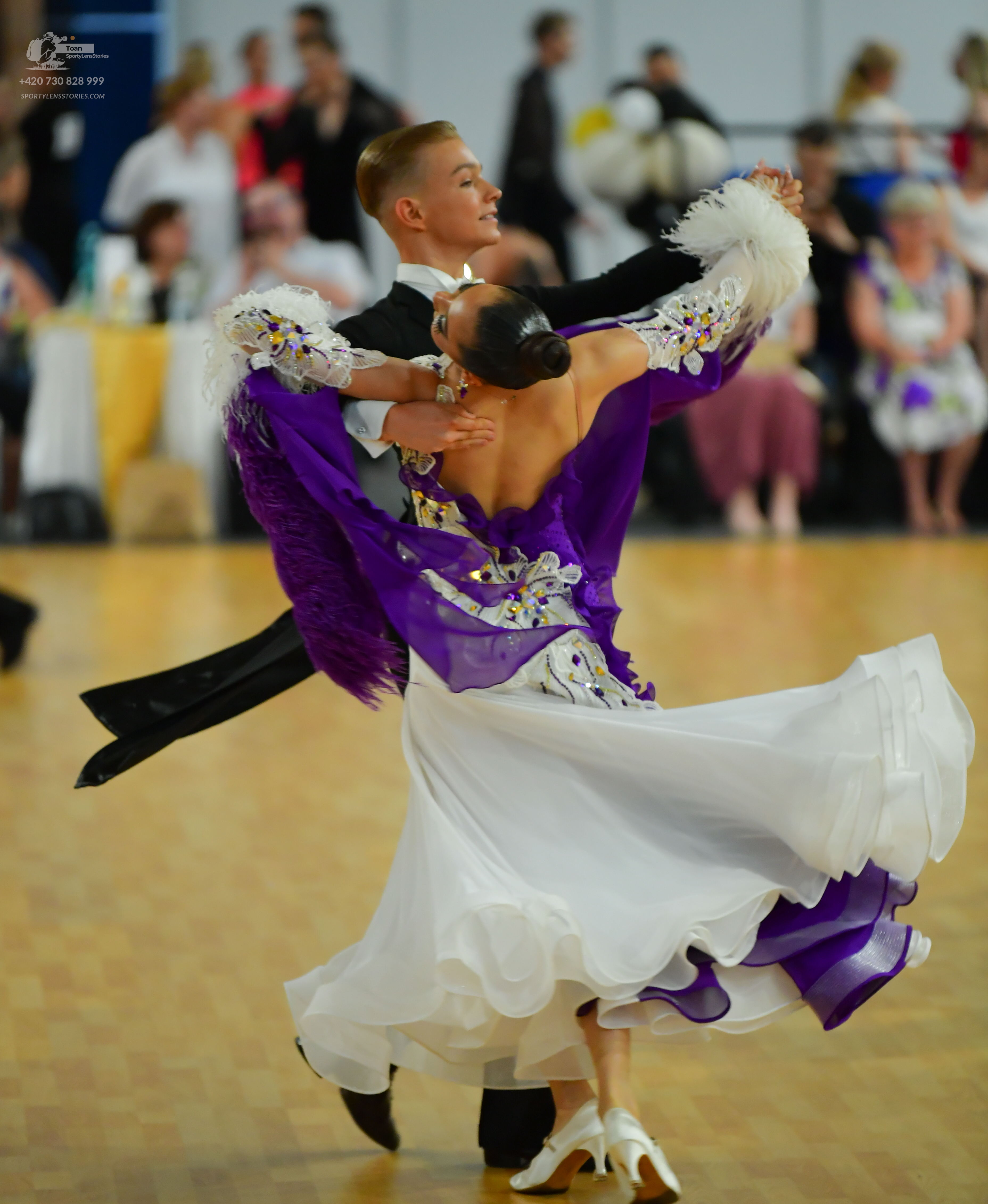 Dancesport competitor: ** Black tail suit