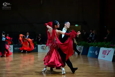 Dancesport competitor #11: Main male dancer: black suit with white shirt
