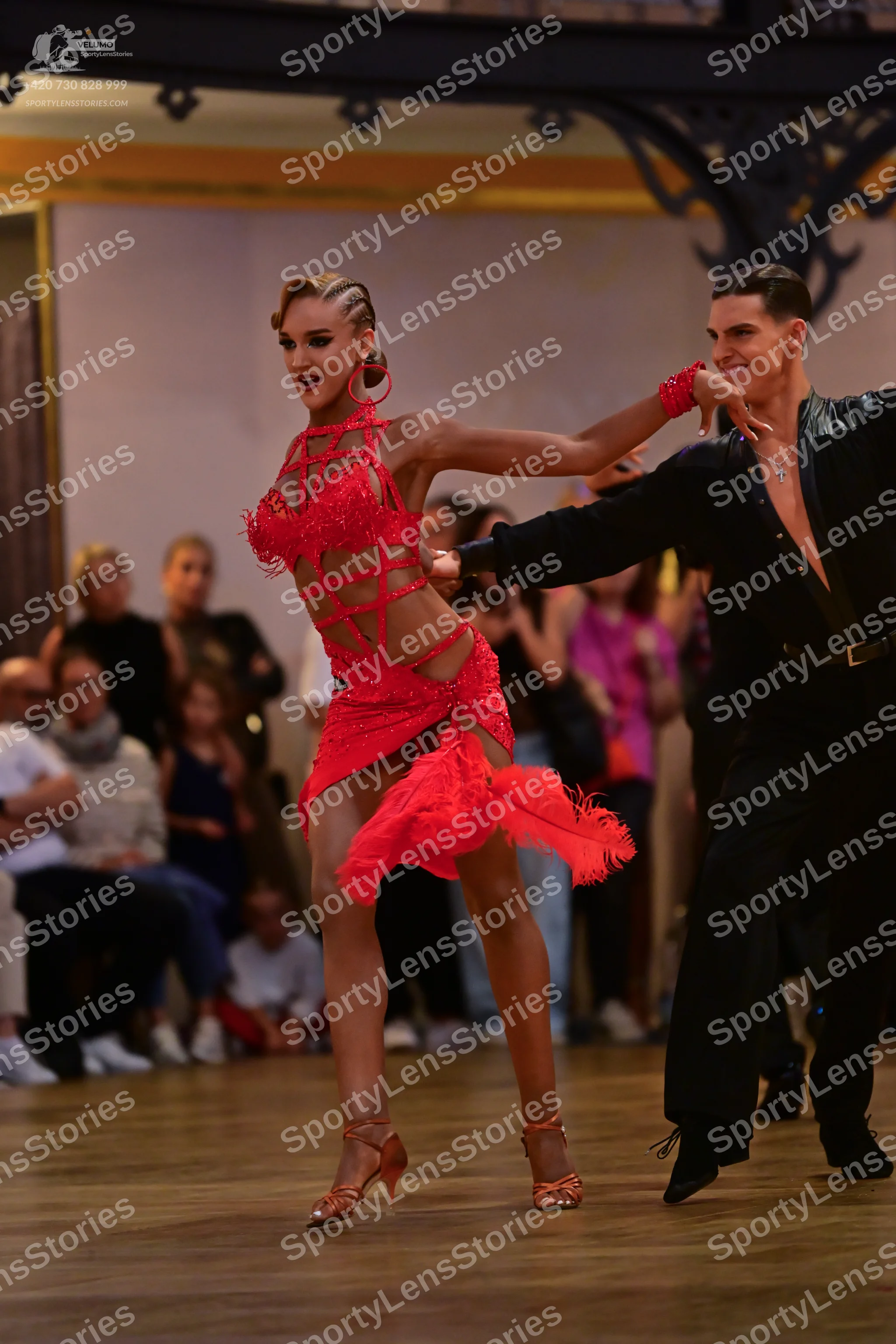Dancesport competitor: Male dancer: black shirt worn open and black trousers