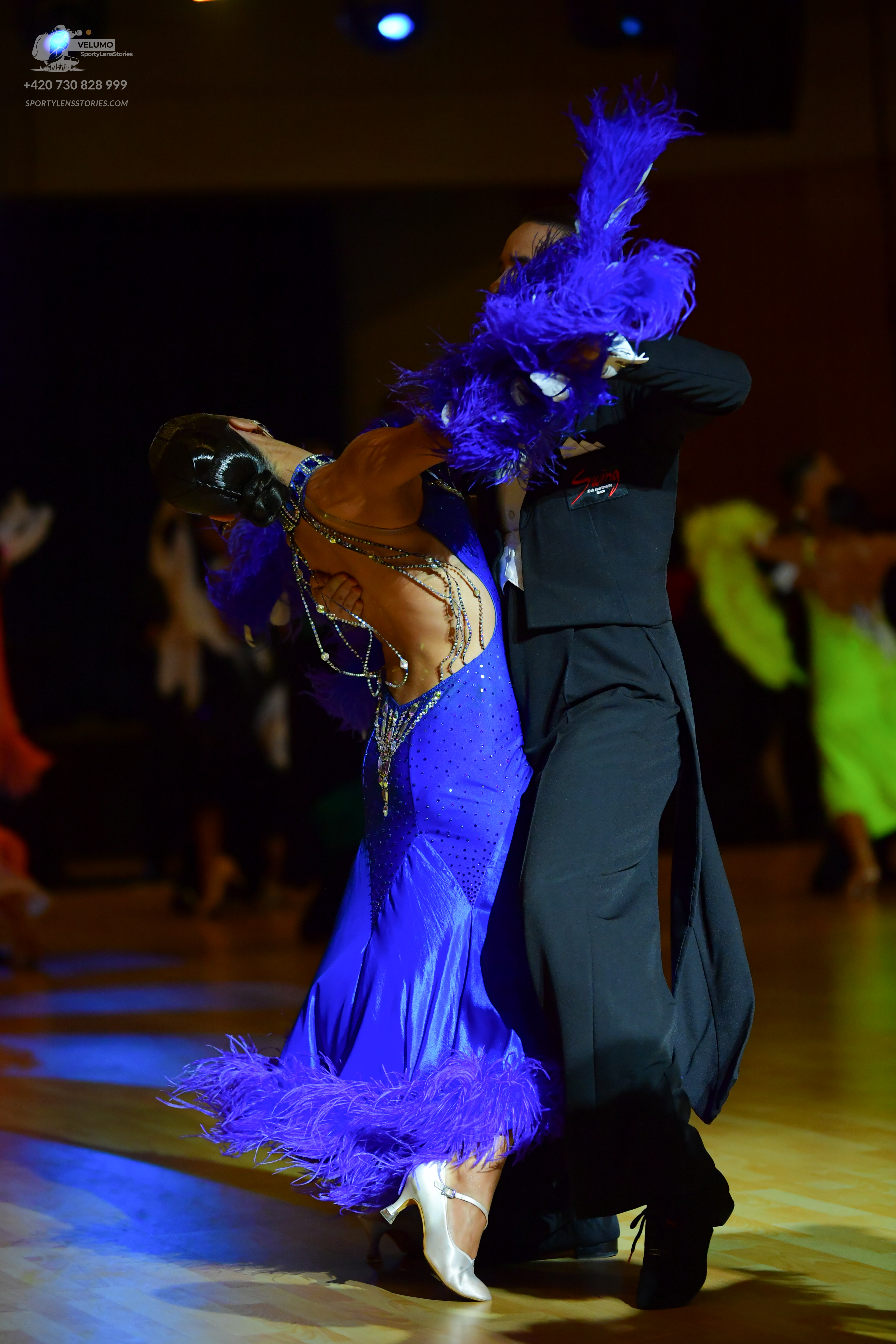 Dancesport competitor: Male dancer: black ballroom suit