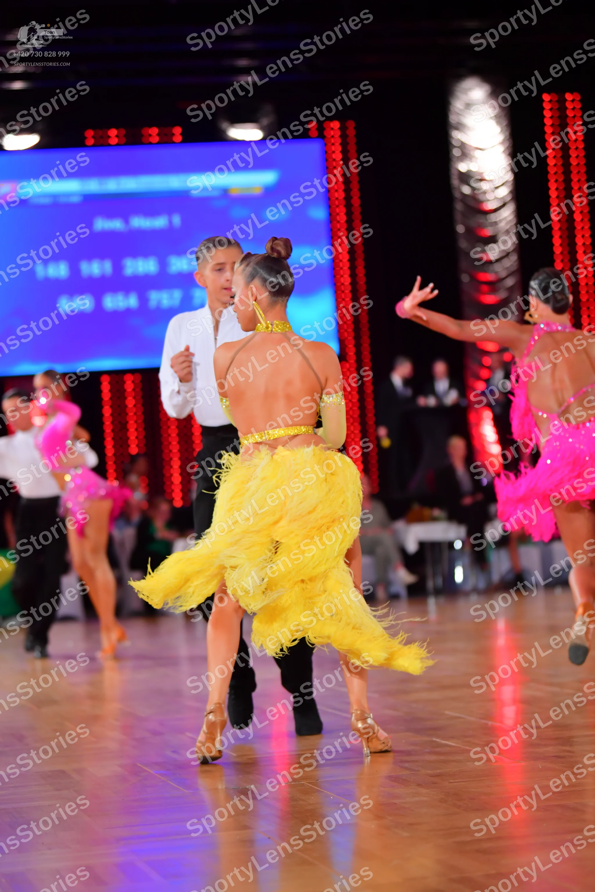 Dancesport competitor: Male dancers: white long-sleeved shirts and black trousers