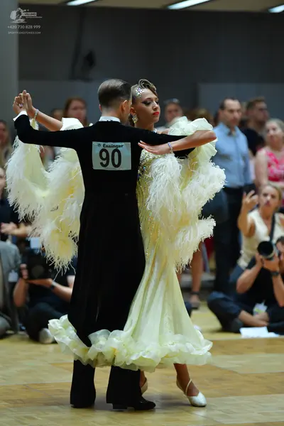 Dancesport competitor #90: Male dancer: black long-sleeved top and black trousers