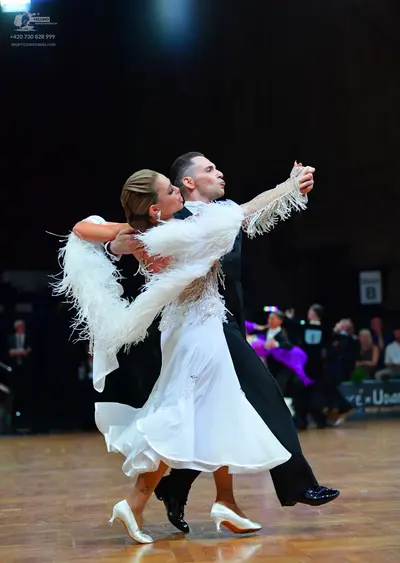 Dancesport competitor: Male dancer: black suit