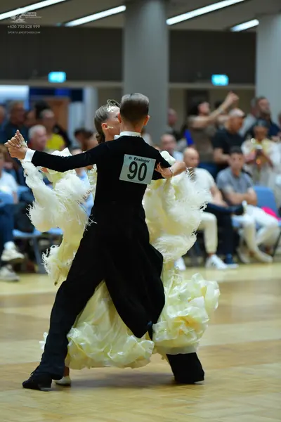 Dancesport competitor #90: Male dancer: black ballroom tailcoat and black trousers