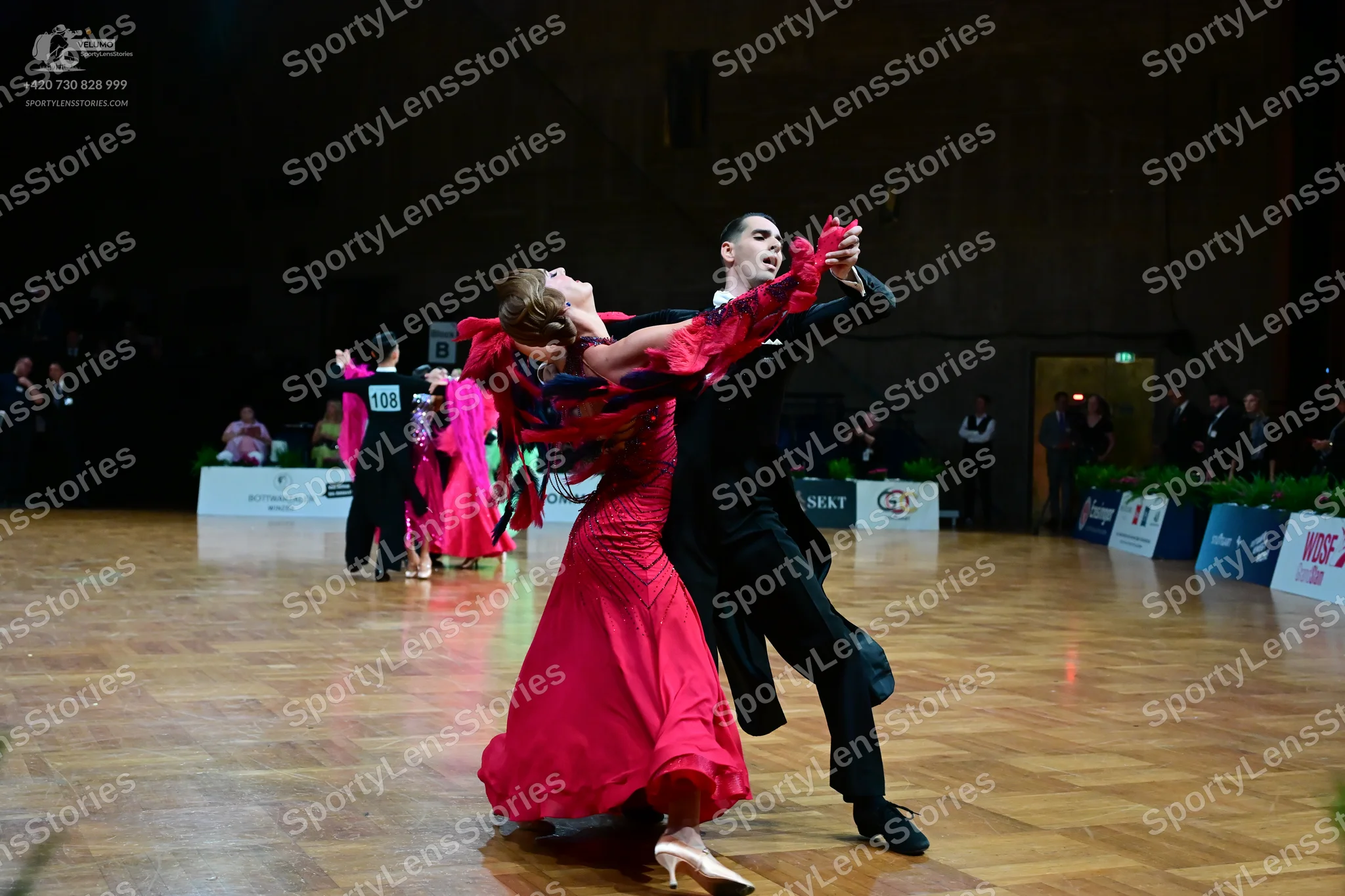 Dancesport competitor #408: Female dancer: red satin ballgown with long sleeves