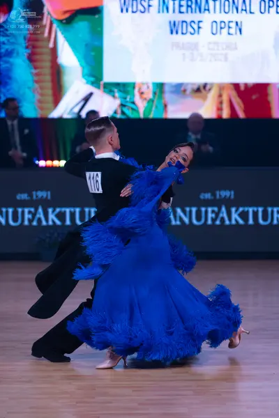 Dancesport competitor: Male dancer: black suit