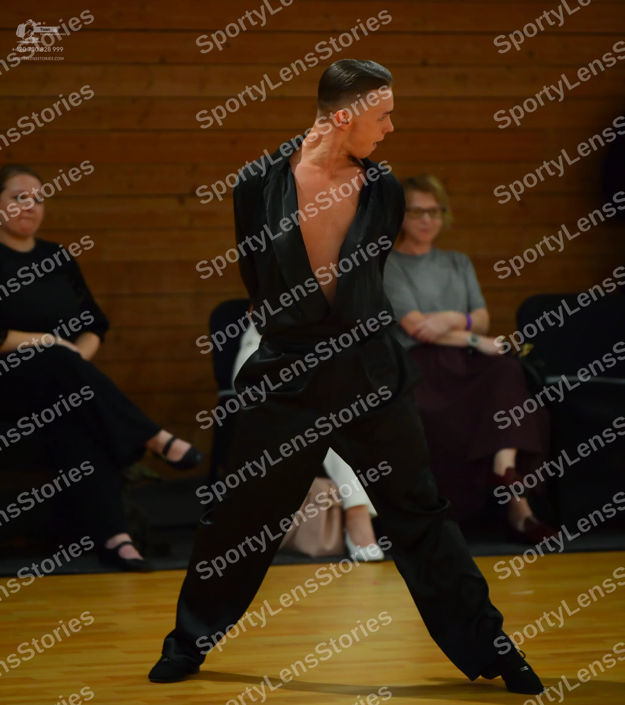Dancesport competitor: ** Male: Black tailsuit with sequin lapels and a matching tie
