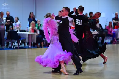 Dancesport competitor #431: Male dancer: black suit