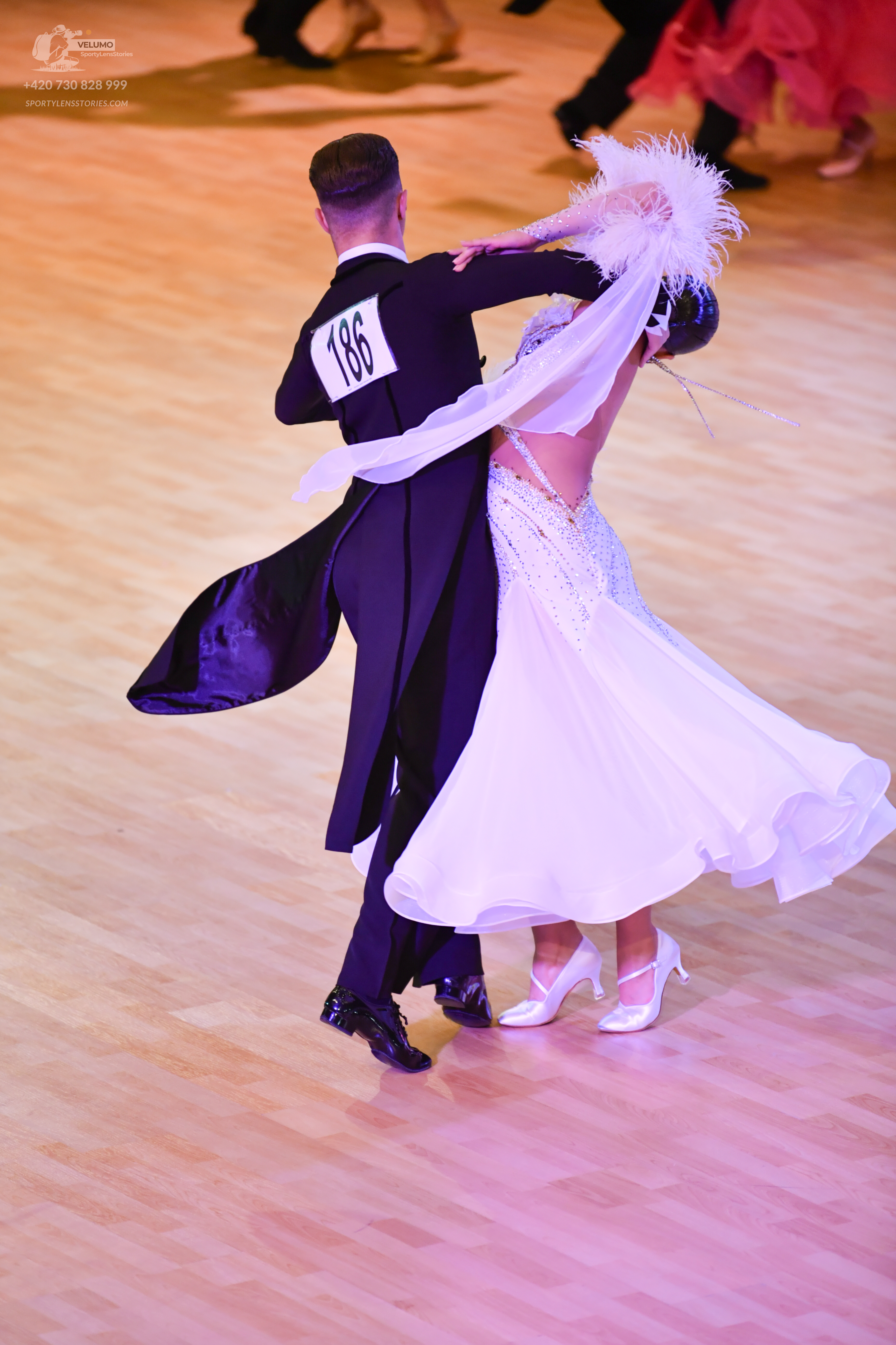Dancesport competitor: ** Male: Black tuxedo with a black satin jacket and black trousers