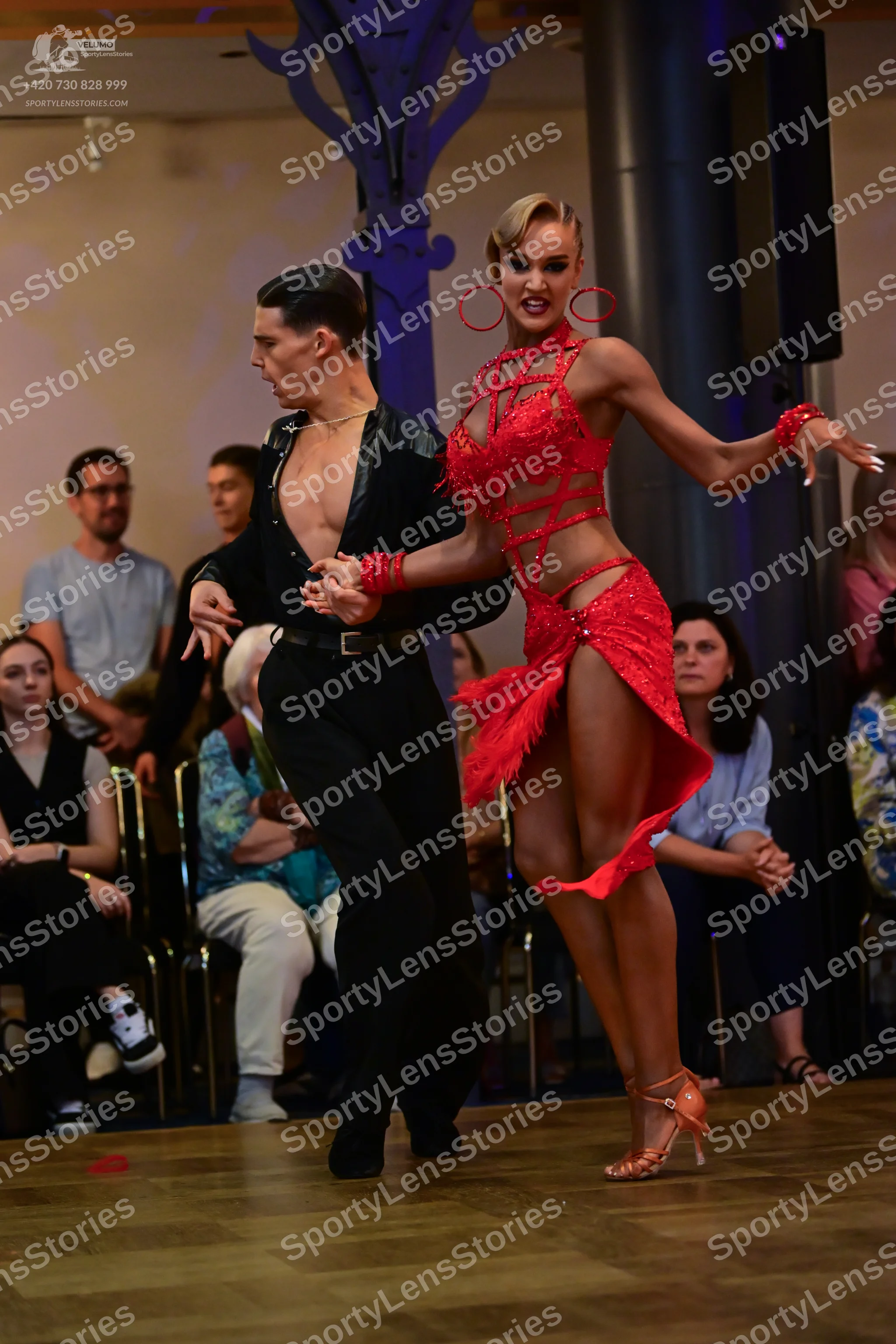 Dancesport competitor: Male dancer: black long-sleeved shirt and black trousers