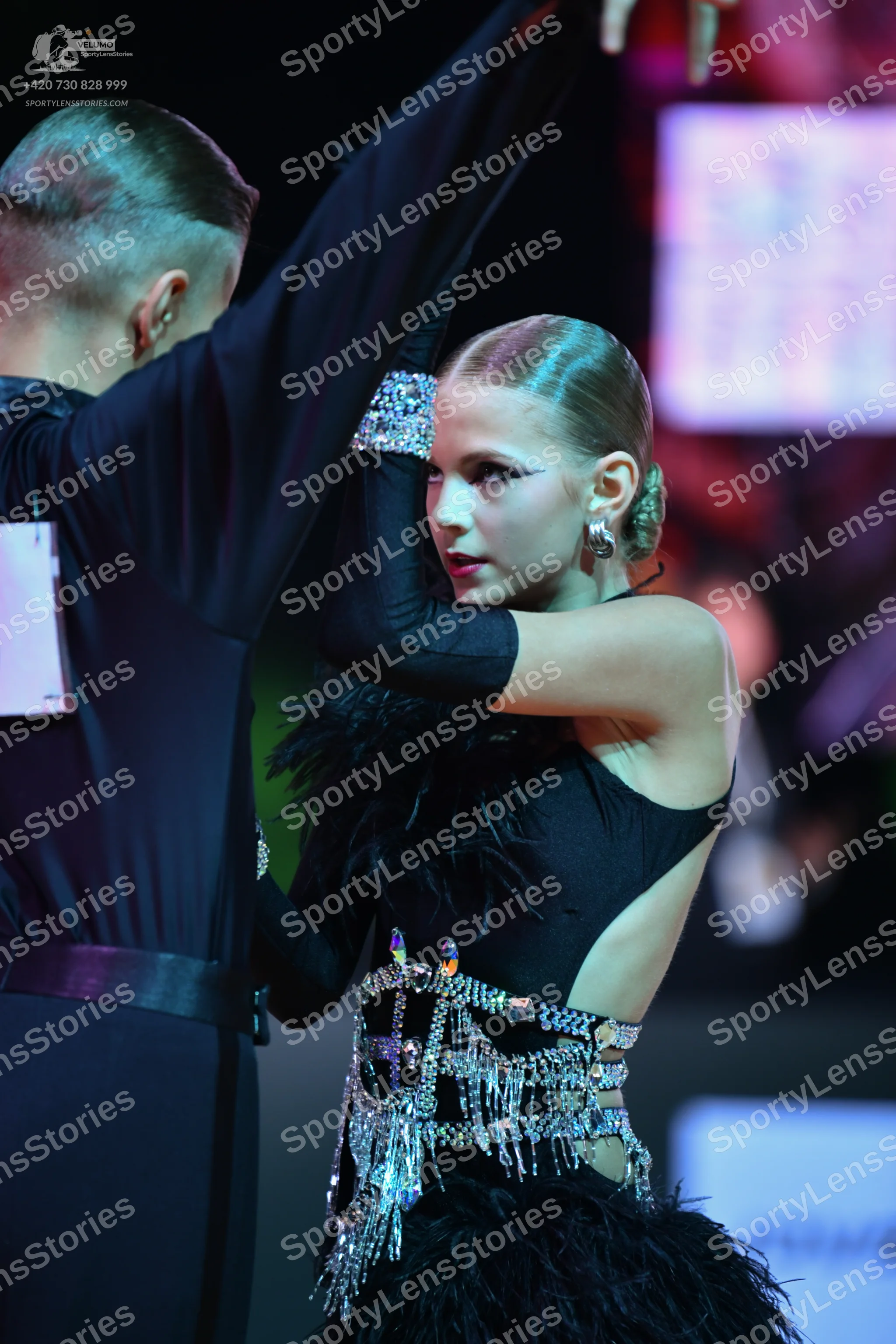 Dancesport competitor: Male dancer: black long-sleeved dance top