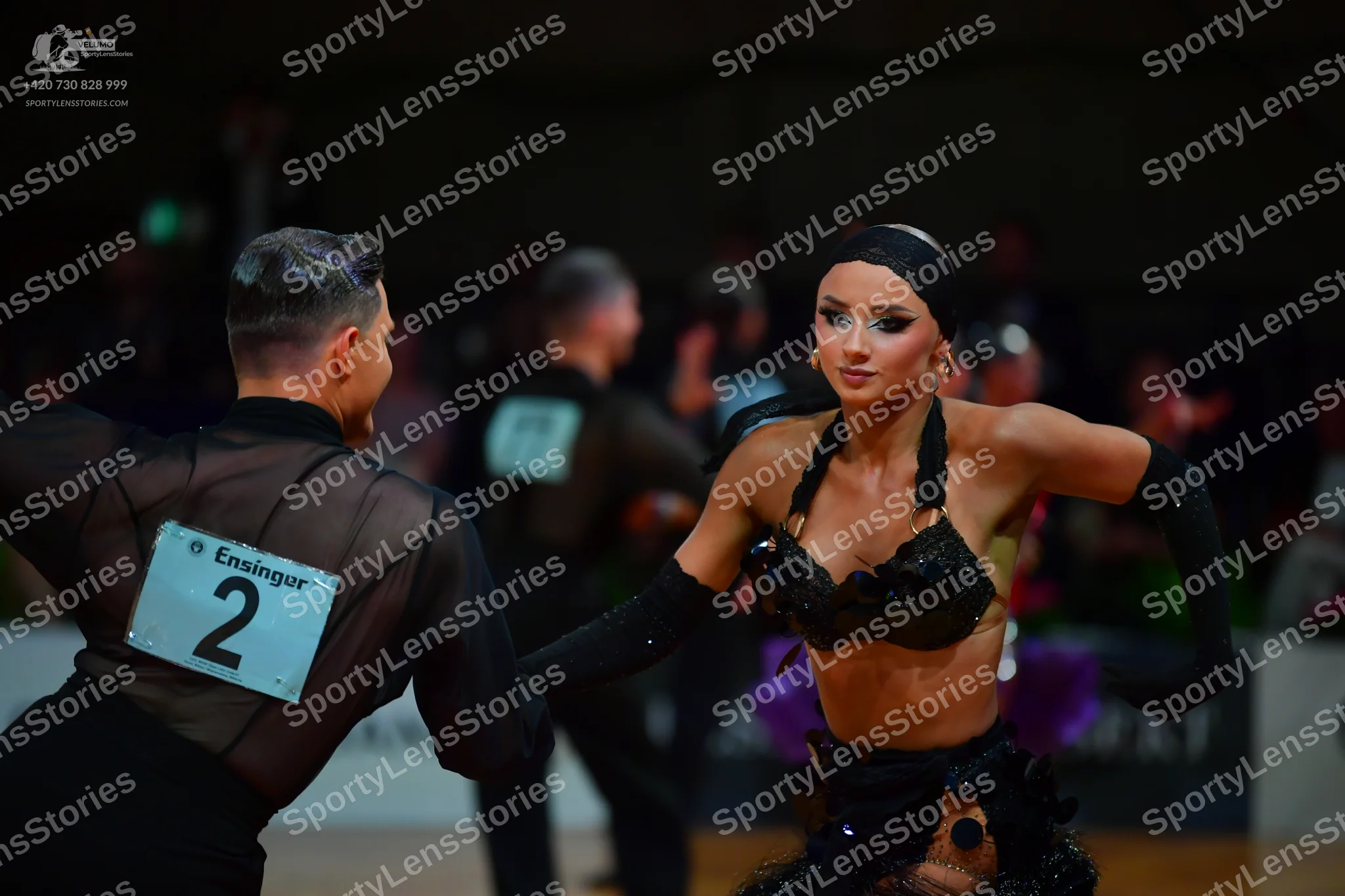 Dancesport competitor: Male dancer: black mesh top