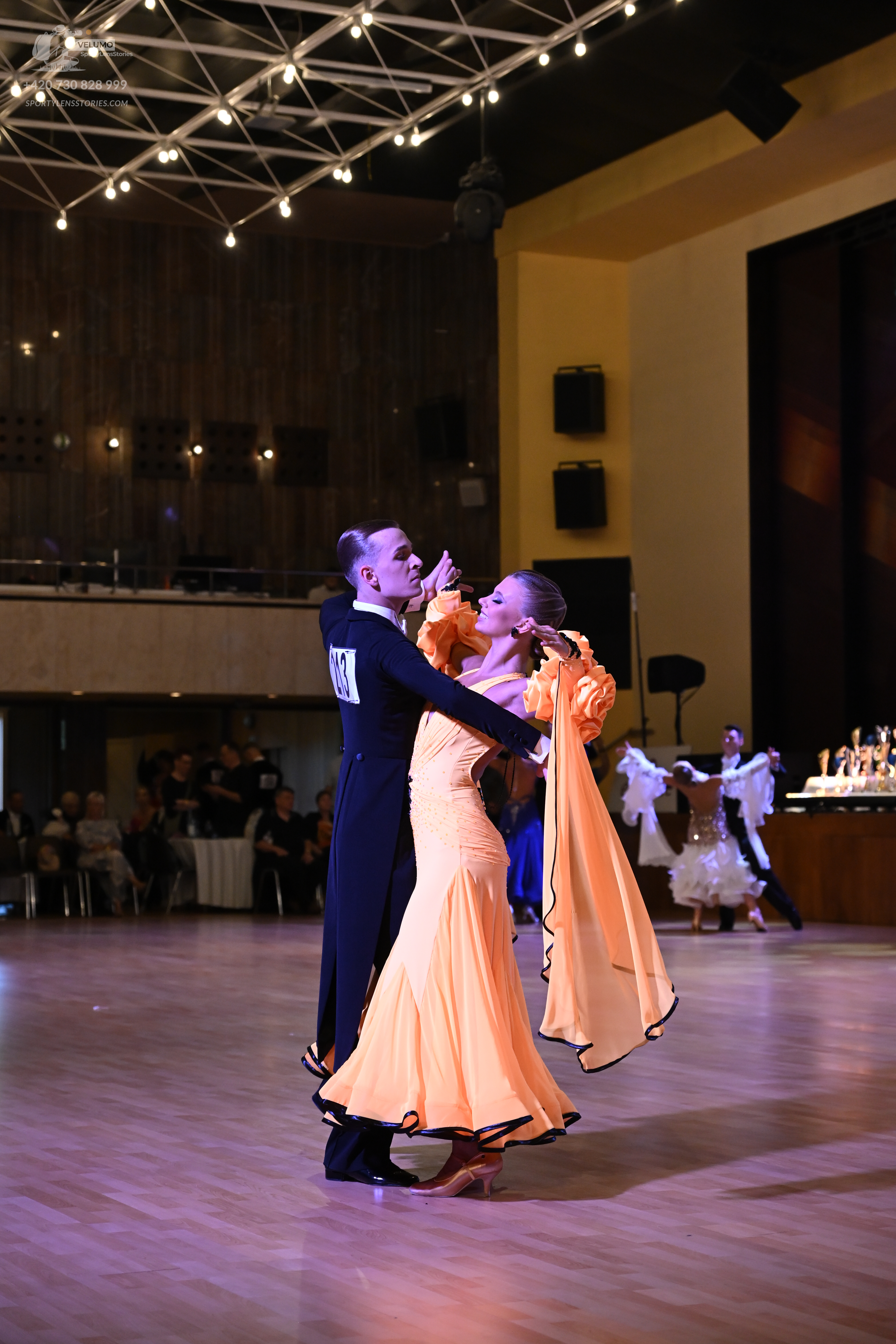 Dancesport competitor: ** Black tail suit