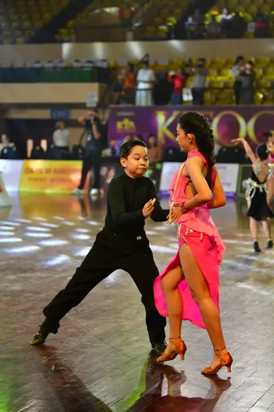 Dancesport competitor: Male dancer: black dance suit