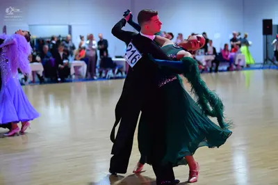 Dancesport competitor #216: Male dancer: black suit