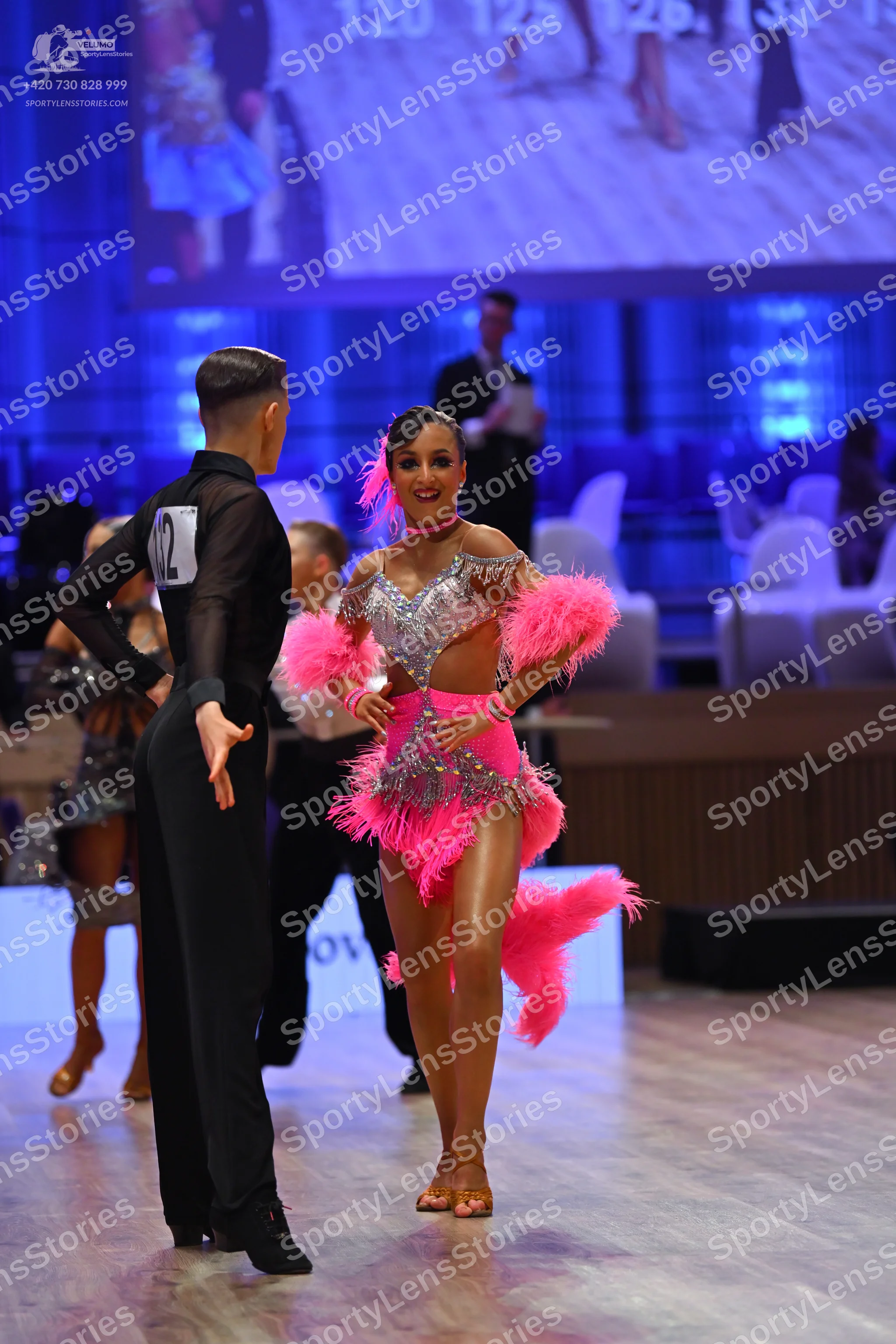 Dancesport competitor: Male dancer: black long-sleeved shirt and black trousers