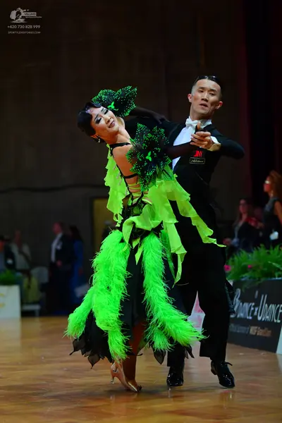 Dancesport competitor: Male dancer: black suit