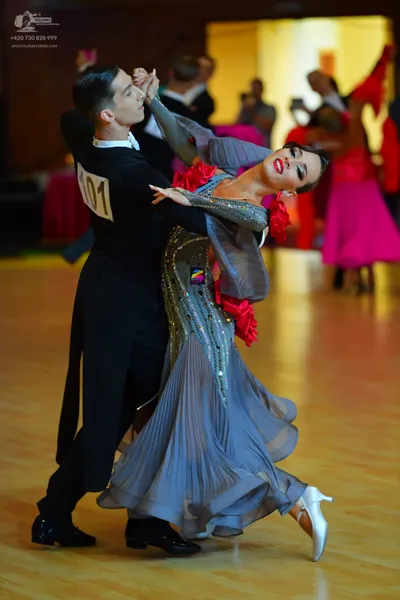Dancesport competitor #101: Male dancer: black long-sleeved top and black trousers