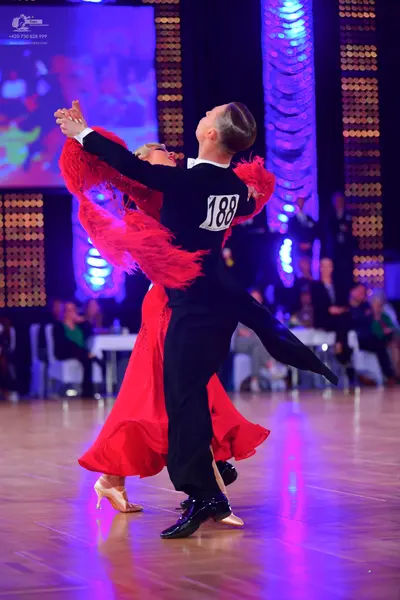 Dancesport competitor #188: Male dancer: black long-sleeved shirt and black trousers