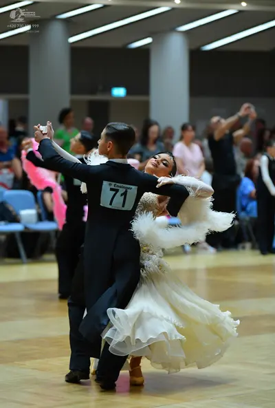 Dancesport competitor #71: Male dancer: black suit