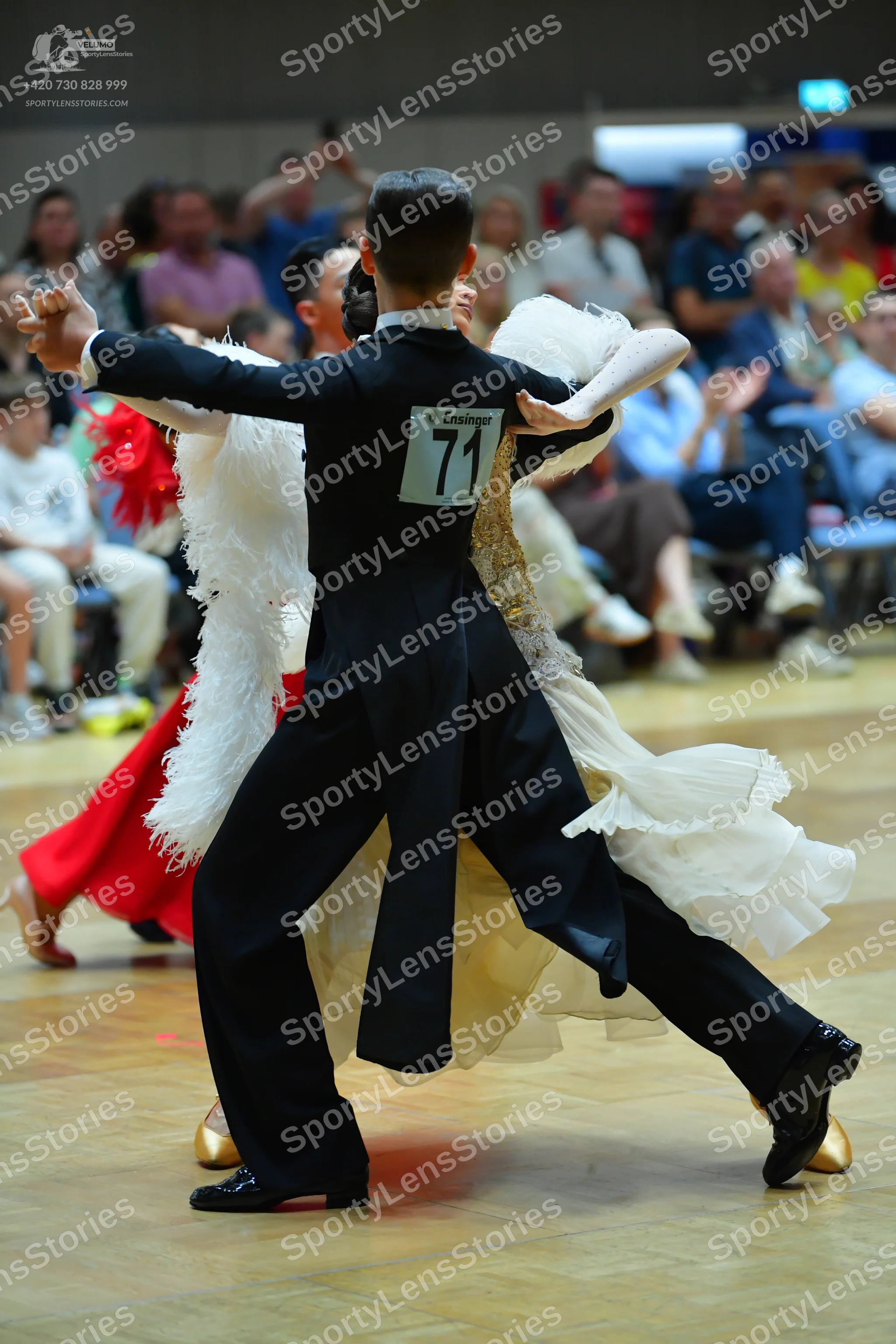 Dancesport competitor #71: Male dancer: black suit and black dance shoes