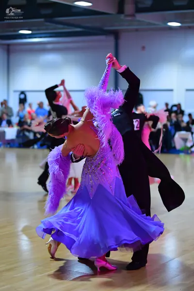 Dancesport competitor #12: Male dancer: black ballroom suit