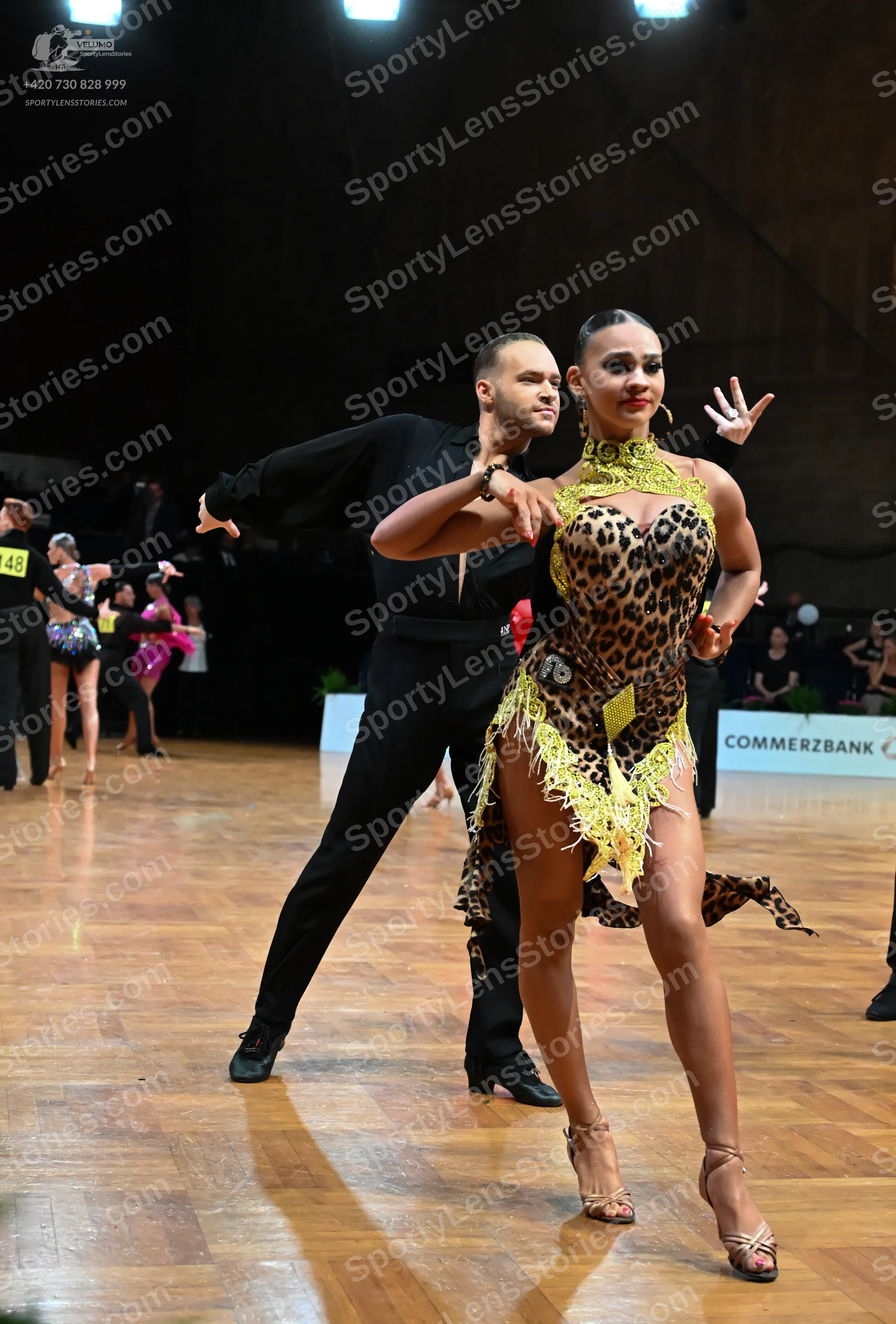 Dancesport competitor #48: Male dancer: black long-sleeved shirt and black trousers
