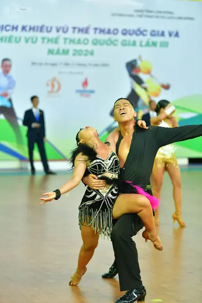 Dancesport competitor: ** Black tail suit