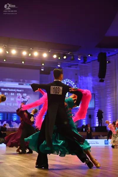 Dancesport competitor: Male dancer: black suit and trousers