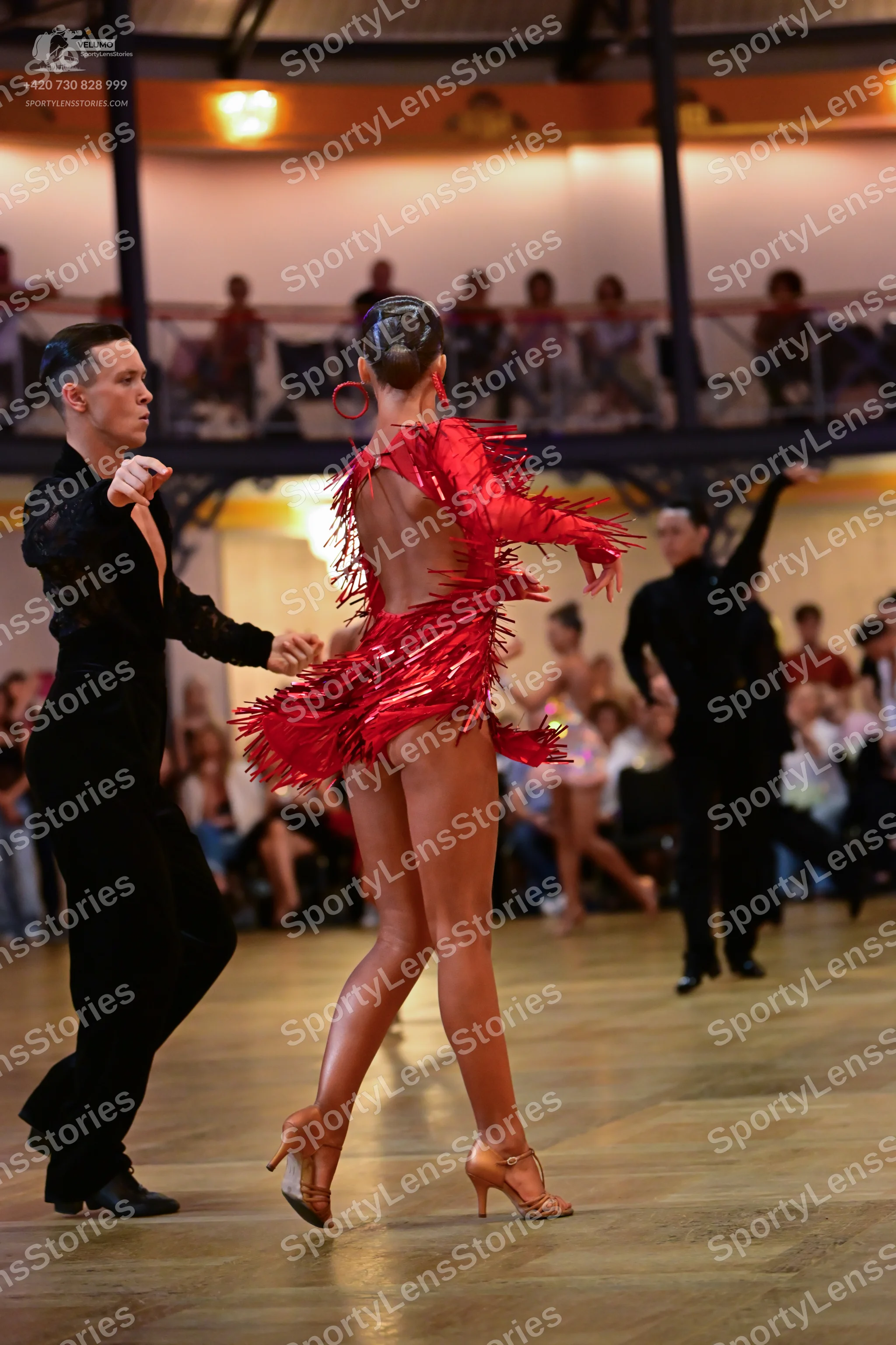 Dancesport competitor: Male dancer: black long-sleeved shirt and black trousers
