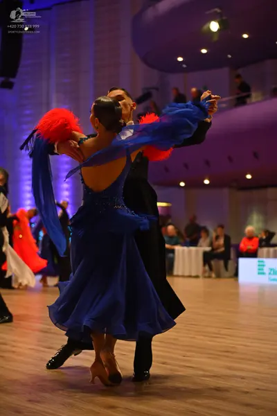 Dancesport competitor: Male dancer: black suit