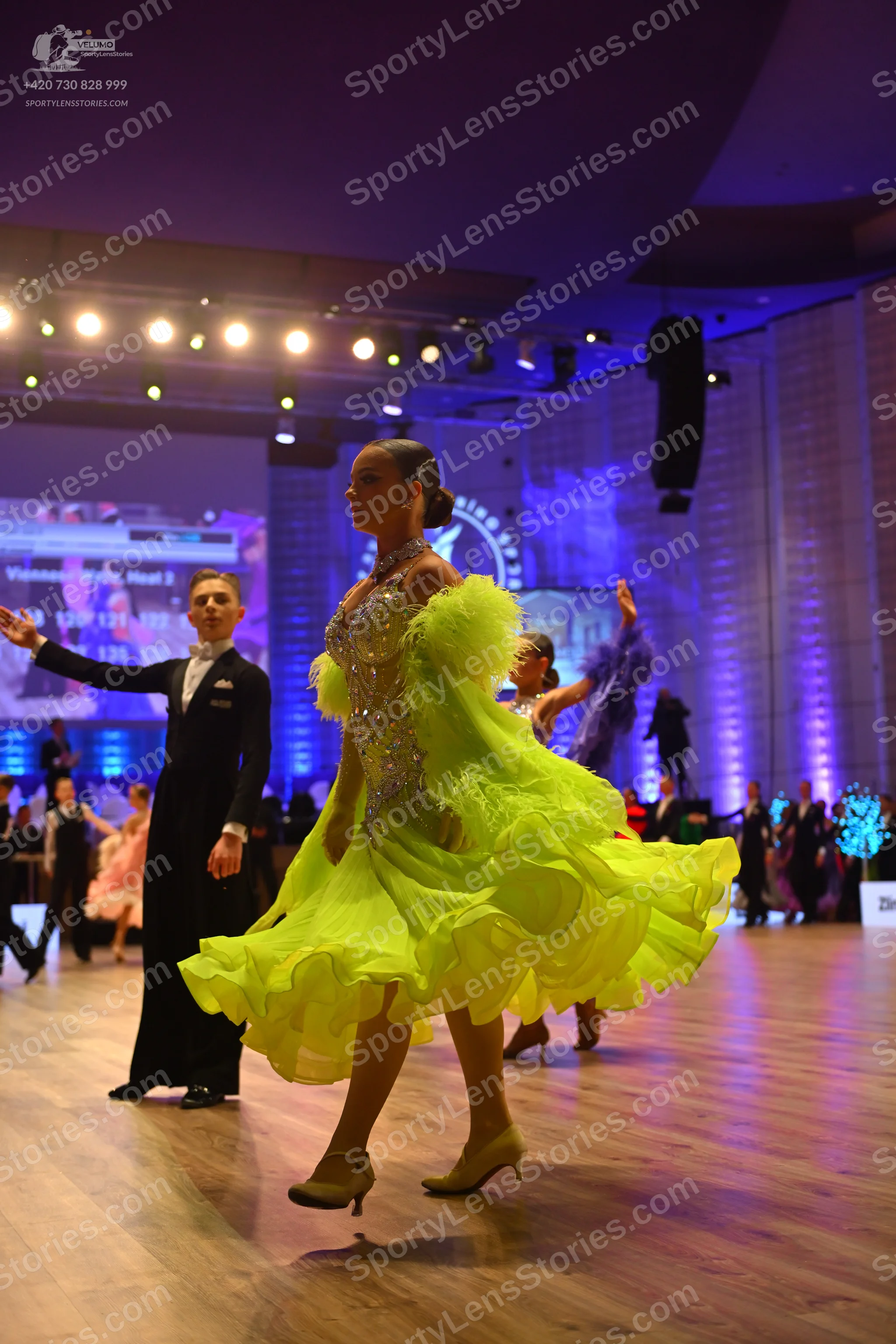 Dancesport competitor: Male dancer: black suit, white shirt, and black bowtie