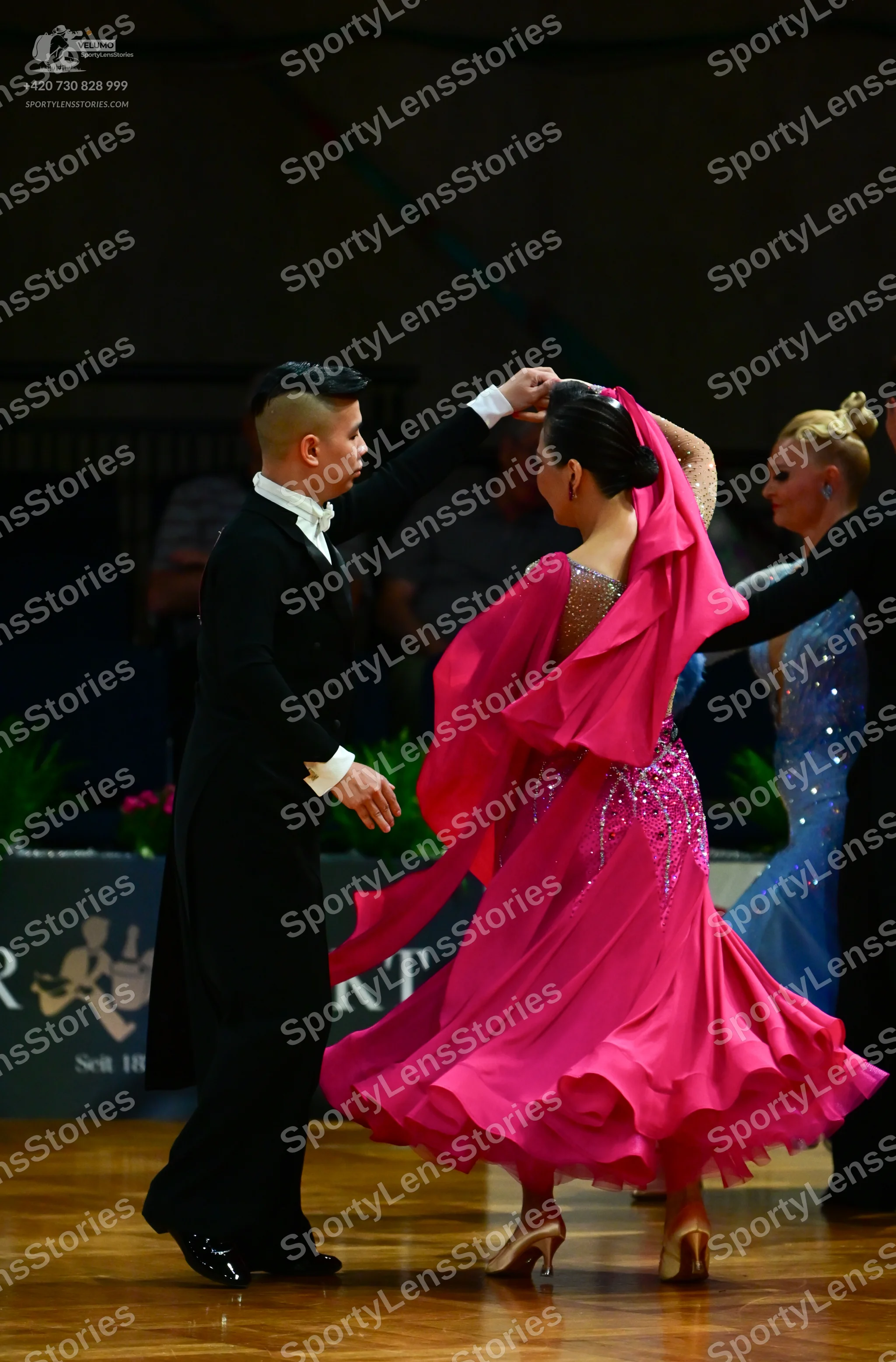 Dancesport competitor: Male dancer: black tailcoat suit with a white shirt and cuffs