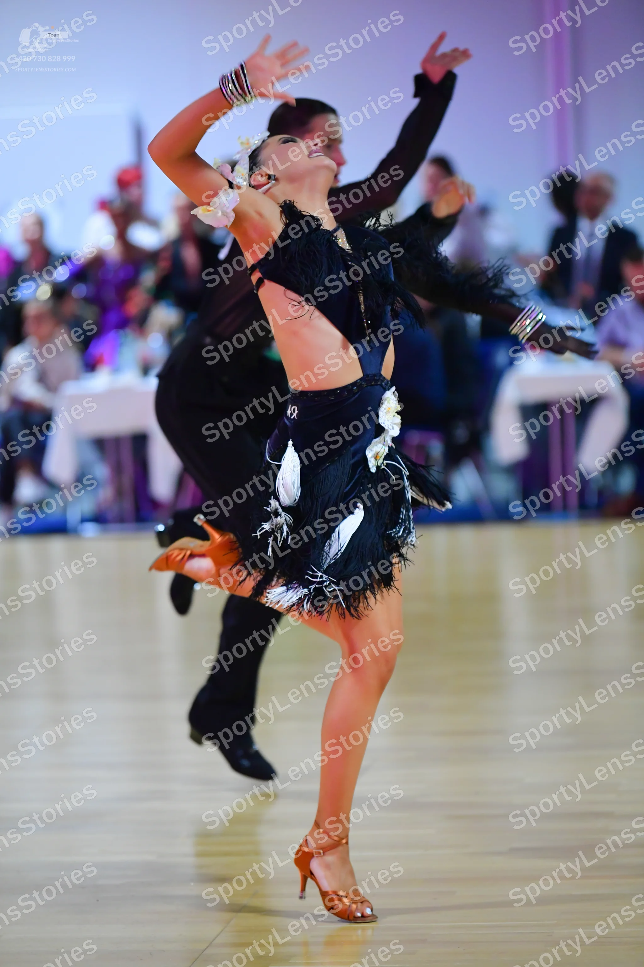 Dancesport competitor: Male dancer: black dance shirt and trousers with black dance shoes