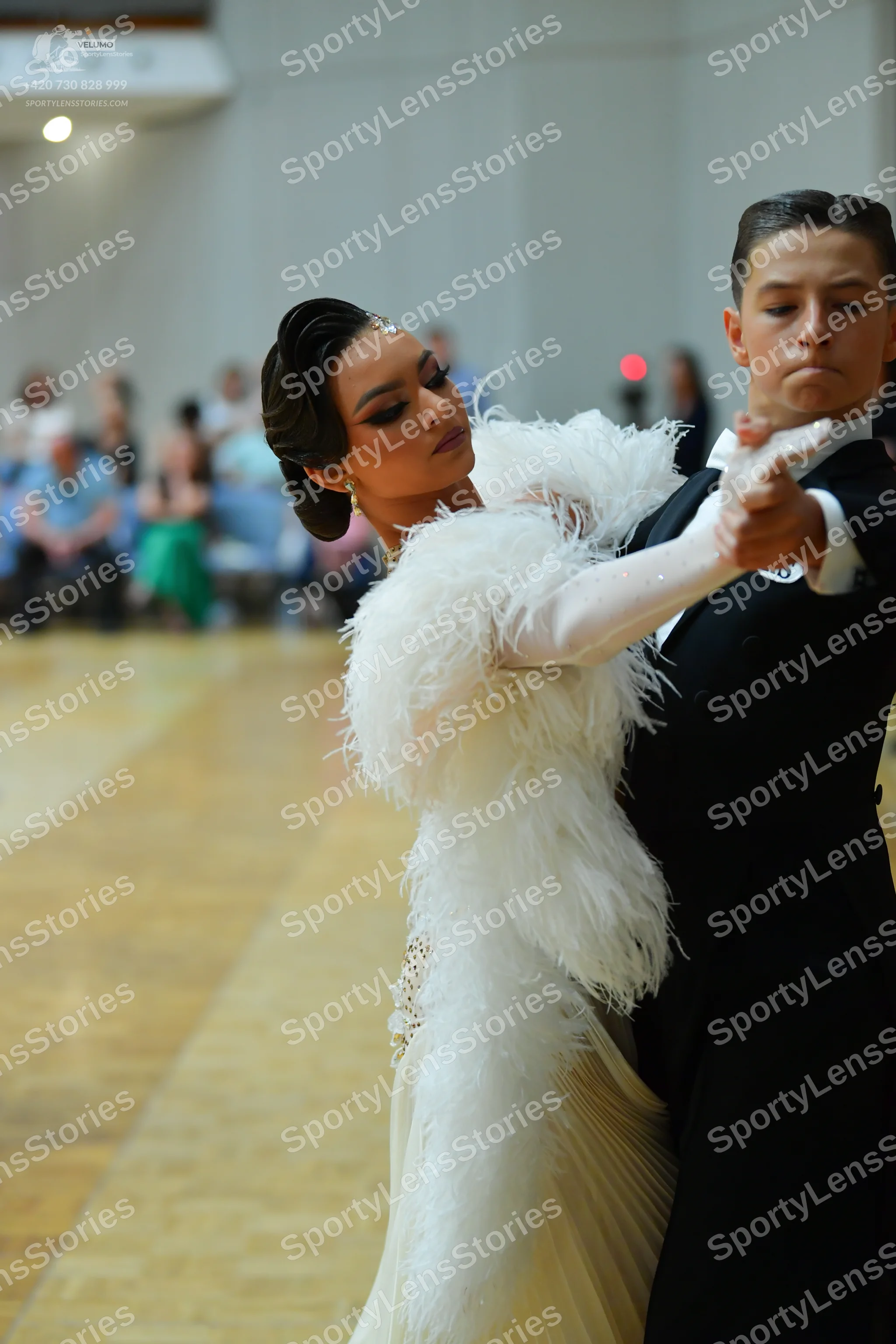 Dancesport competitor: Male dancer: black suit